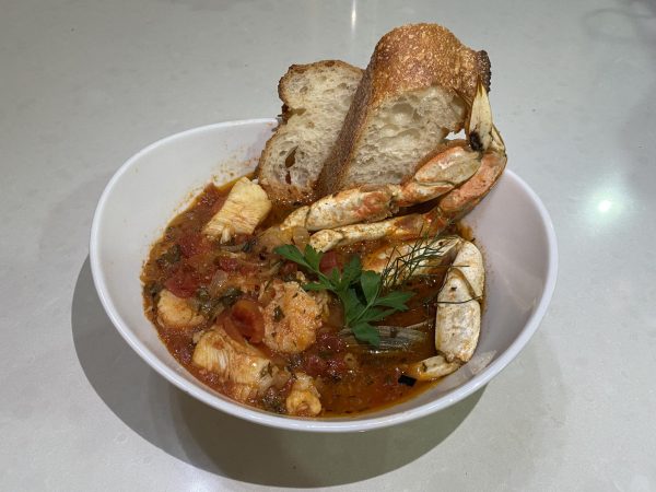 A hearty bowl of cioppino, laden with heaps of shellfish bathed in a luscious and deeply savory tomato broth. Paired with some crusty sourdough bread, cioppino makes for a perfect comfort meal.