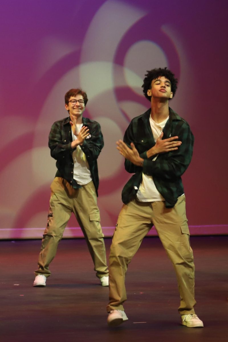Kinetic Krew dancers Zachary Soraire (11) and Kai Stinson (12) dance to JUMPIN by Pitbull and Lil Jon. Their dance represented Australia.