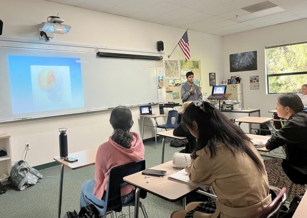 Psych club officer Varun Thvar (11) leads a virtual speaker session featuring Dr. Matcheri Keshavan, a neuroscientist who works at the Beth Israel Medical Center in Boston. Dr. Keshavan educated Psych Club members on the different parts of the brain.