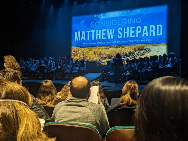 Audience members settle in as Considering Matthew Shepard begins. The oratorio was written by Craig Johnson.