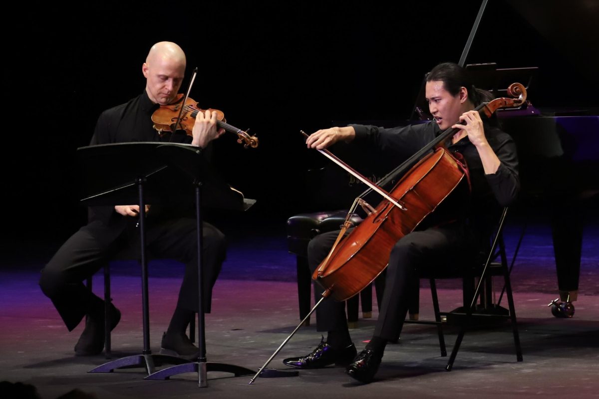 Moni Simeonov on the violin and Jonah Kim on the cello play “Duo for Violin and Cello, Op. 7 together in the Patil theater on Friday. Their performance was in “Songs that Make Us Dance, a Harker Concert Series production.