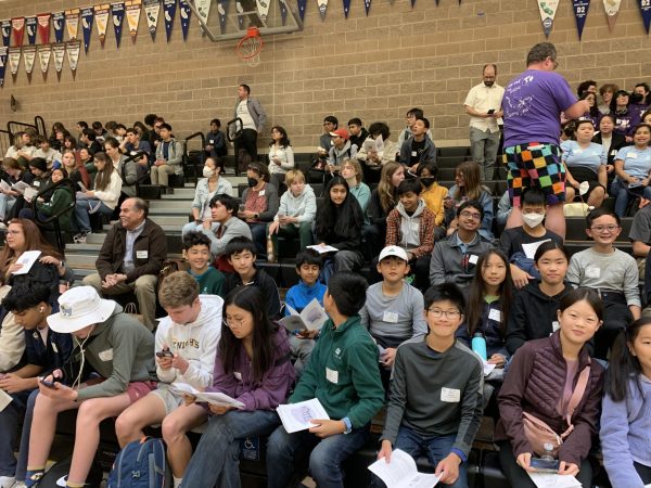 Harker Junior Classical League members sit in bleachers during the Ludi General Assembly on Nov. 4 at Saint Francis Catholic High School. Students participated in a variety of activities like certamen, a classics-themed quiz bowl, and art competitions. (Provided by Lisa Masoni)