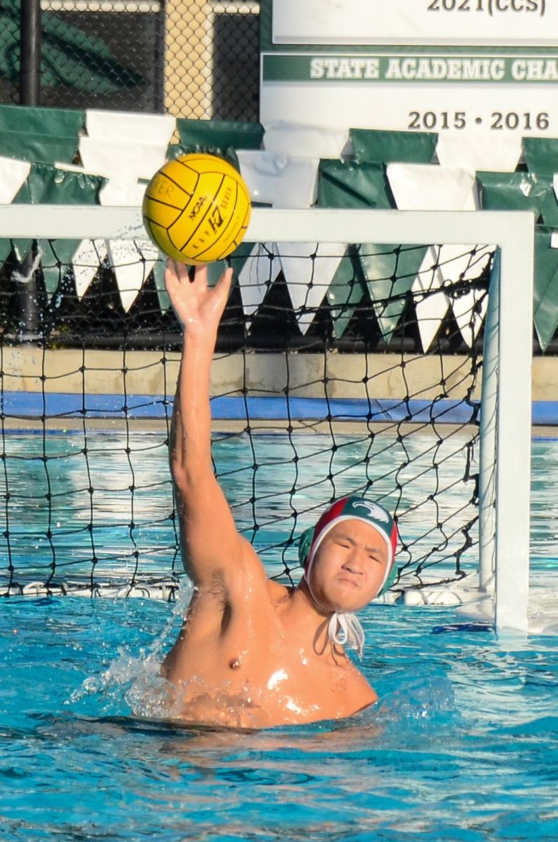 Goalie Aidan Wang (11) blocks an incoming shot. Multiple players credited strong defense as the key to their success against Palo Alto