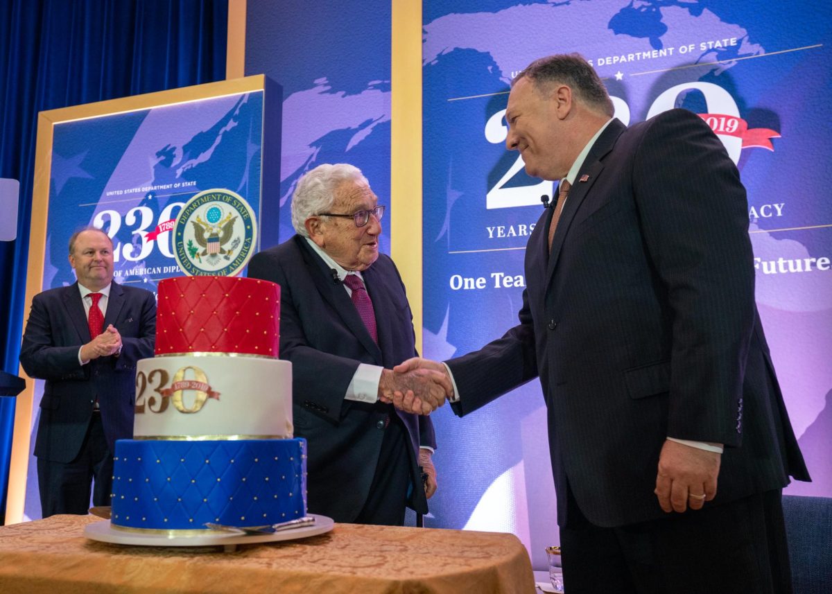 Former Secretary of State Dr. Henry Kissinger shakes hands with U.S. Secretary of State Michael R. Pompeo. Kissinger remained active and prominent in global politics long after his retirement. (Provided by state.gov)
