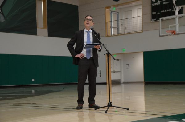 Head of Upper School Paul Barsky speaks to frosh, sophomores and juniors in the Athletic Center on Tuesday. Barsky announced he was working with student leadership and faculty to combat cheating and reminded students of the importance of integrity and personal responsibility.