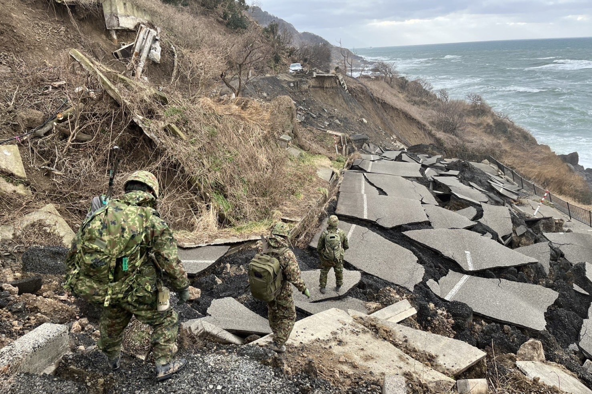The Japan Self-Defense Forces scout around a damaged road, looking for an evacuation route, in the city of Wajima, Ishikawa on Jan. 6. Some people who dont live in the area would like to help, but they dont welcome trucks or food because the roads are destroyed, Japanese teacher Noriyo Ikeda said. (Provided by the Japanese Ministry of Defense)