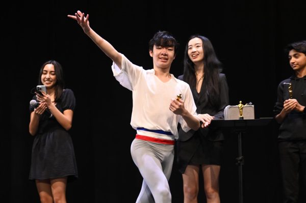 Anwen Hao (11) celebrates his Best exit for a ballet dance Hoscar. 40 students performed in the 12th annual Hoscars on Feb. 8. 