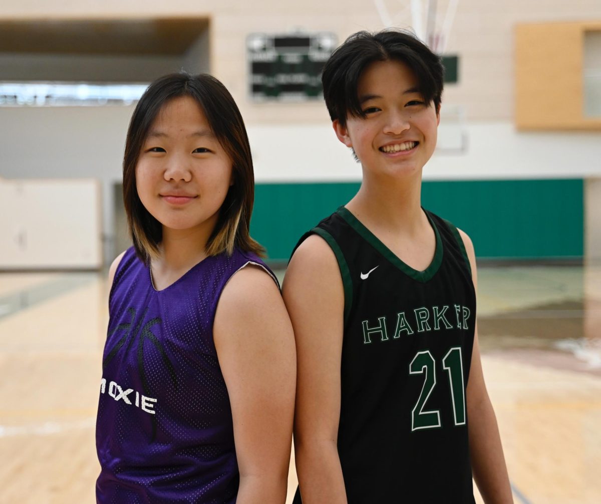 Selina Chen (9) represents her club team while Finley Ho (9) dons a Harker jersey. Both split their time between the varsity girls basketball team and their club teams.