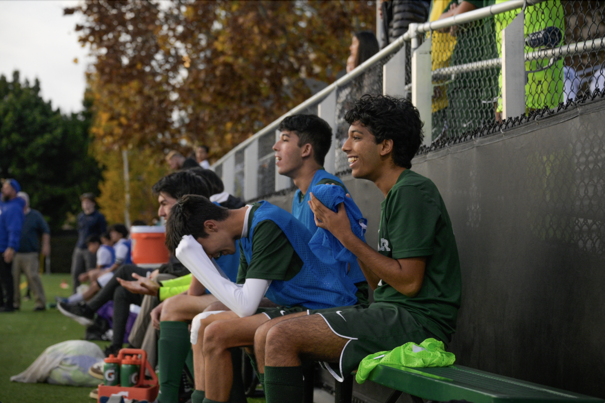 Varsity boys soccer player Saahil Herrero (11) reacts to a referee call as teammate Veer Sahasi (11) cheers on his teammates. The Eagles would go on to lose the match to Santa Clara 2-4. 