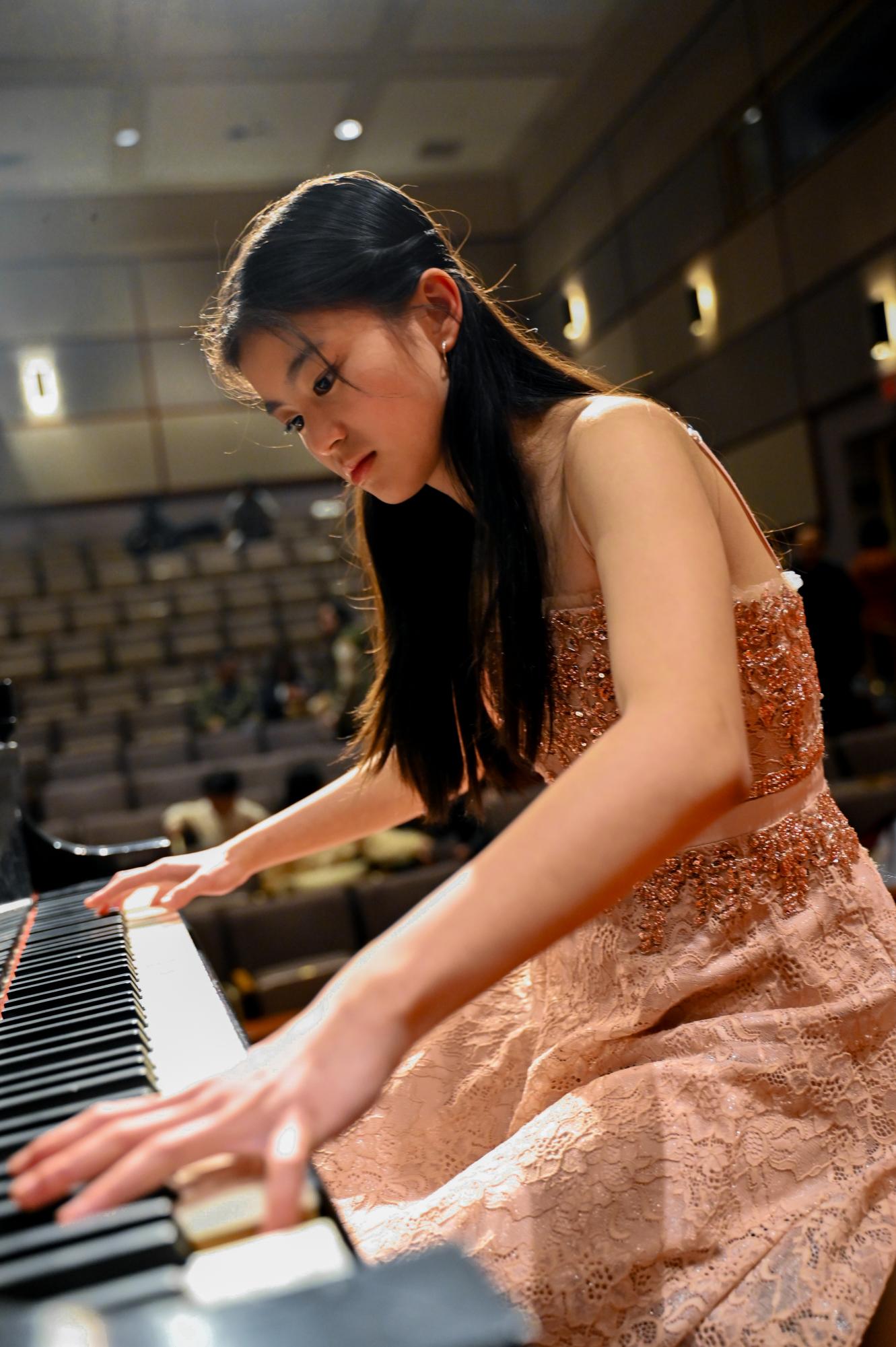 Mindy Truong rehearses before her recital at Santa Clara University on Jan. 28. Her dream is to play Rachmaninoffs Piano Concerto No. 3 with a professional orchestra. 
