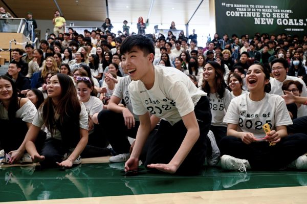 Arthur Wu (11) cheers for his grade before the announcement of the spirit winners. The juniors finished the spirit events in first place with 4,475 points.