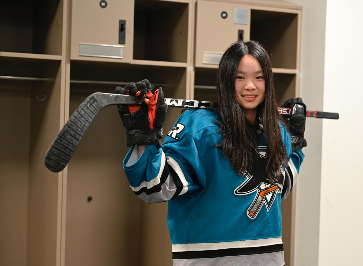 Iris+Wang+%2810%29+poses+with+her+hockey+stick.+%E2%80%9CI+just+really+love+all+the+ups+and+downs+of+hockey%2C%E2%80%9D+Iris+said.+%E2%80%9CYou+win+as+a+team%2C+you+lose+as+a+team%2C+and+although+losing+can+be+hard%2C+I+like+that+its+a+team+experience+and+everyone+lifts+each+other+up.%E2%80%9D