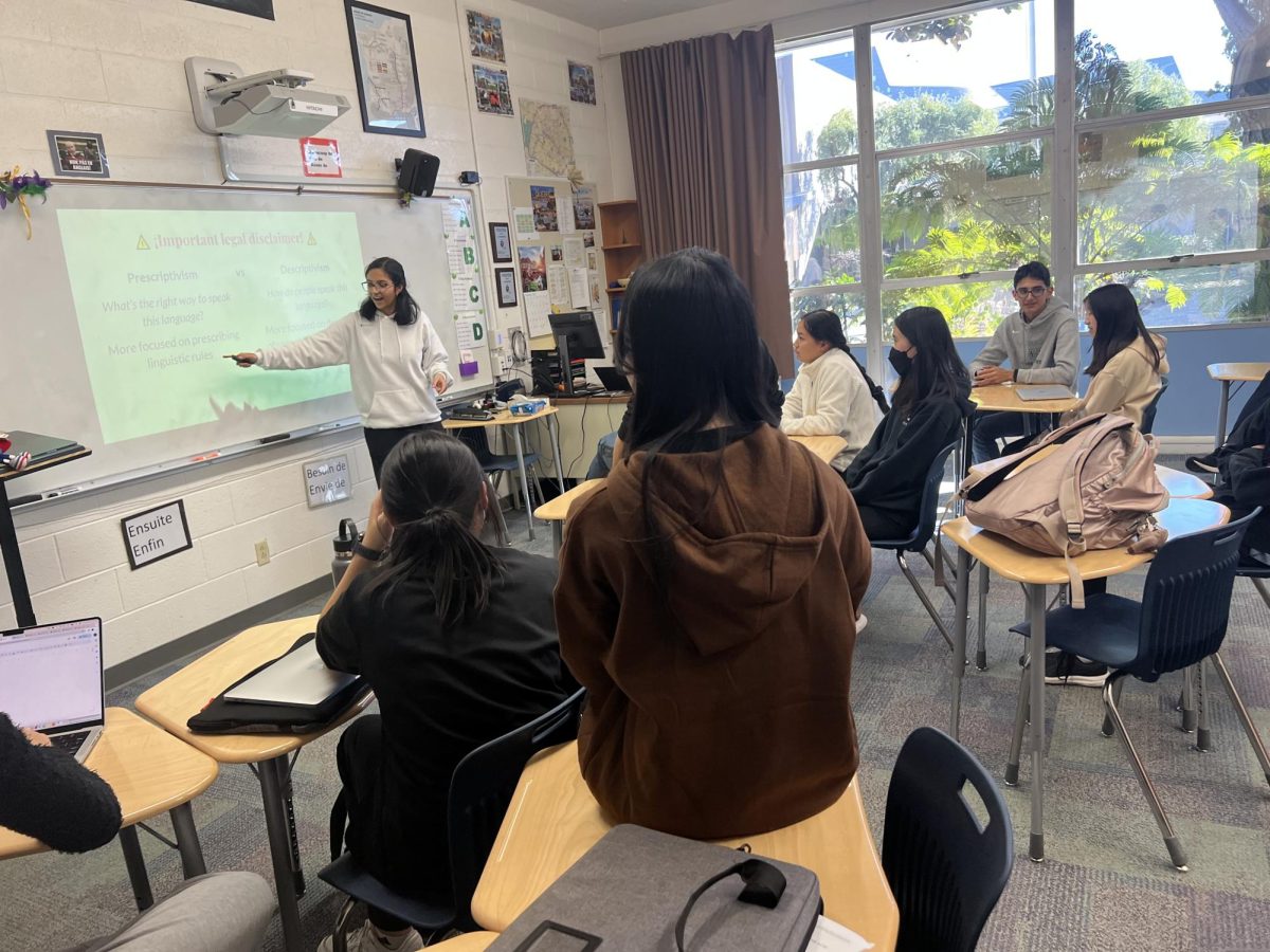 The Language and Linguistics Club meet in upper school French teacher Galina Tchourilovas room on Feb. 27. The presentation focused on sociolinguistics and the diversity of dialects.