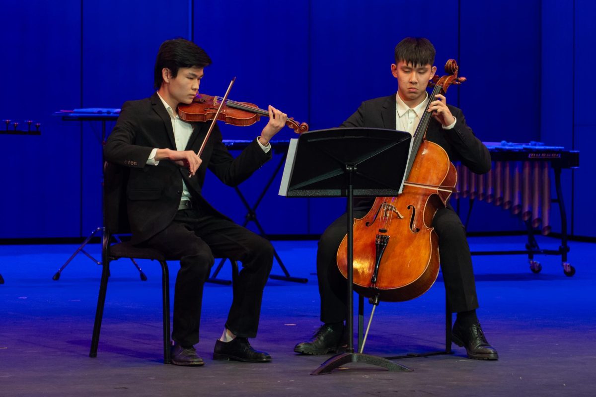 Seniors Joe Li and Dustin Miao play Antonín Dvořák’s Humoresque on the violin and cello. The Chamber Concert featured four duet performances through the evening.