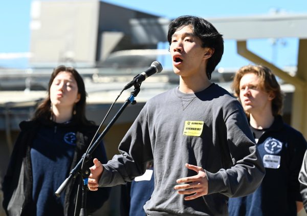 Daniel Wu (22) performs “If Ever I Would Leave You” by Robert Goulet. Daniel and The Spizzwinks visited Harker as a destination of their Hometown Tour.
