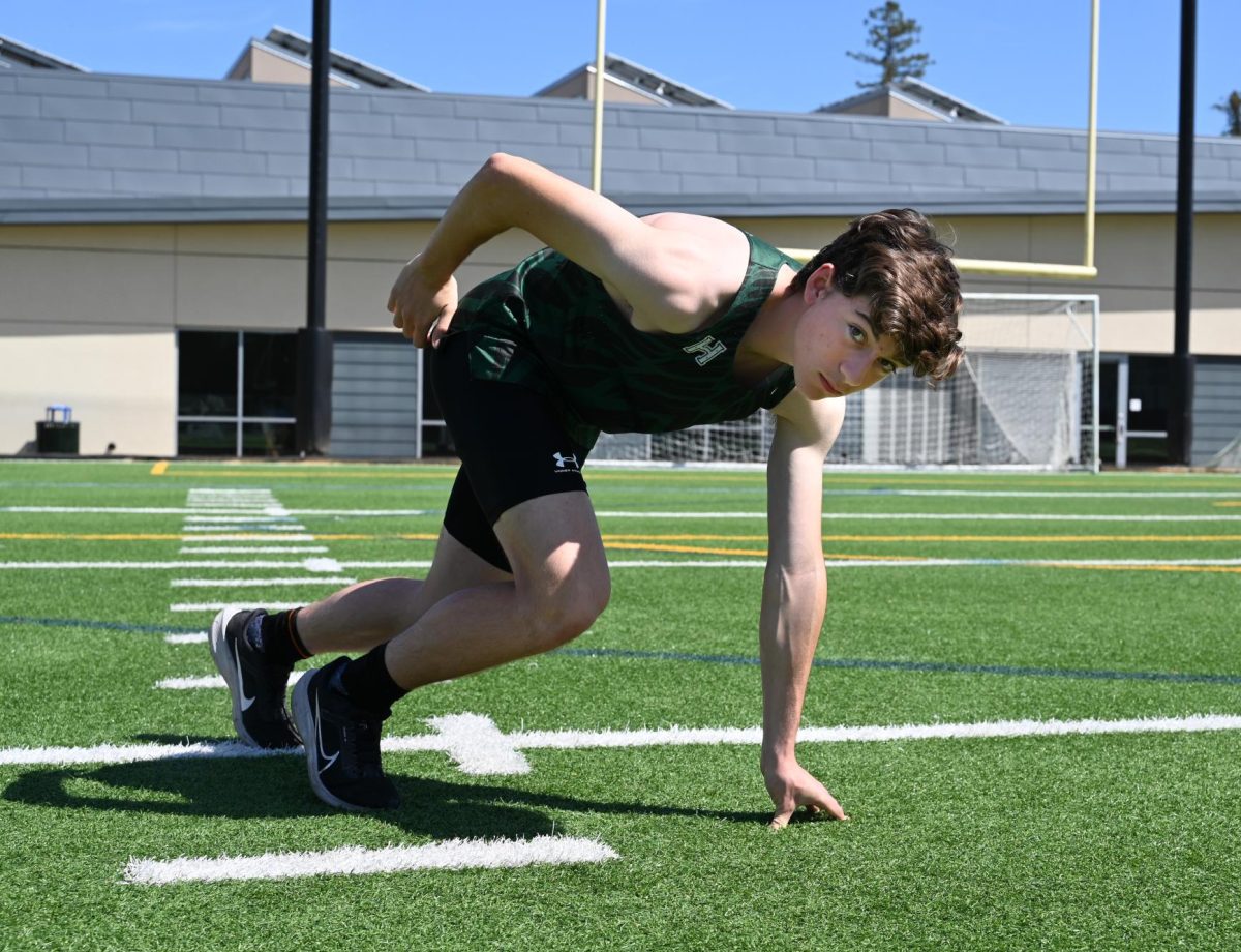 Kaleb Goldin poses in his running stance. I’m running six days a week for about two hours, Kaleb said. Like in everything else I do, practicing lets me get better and be faster.”