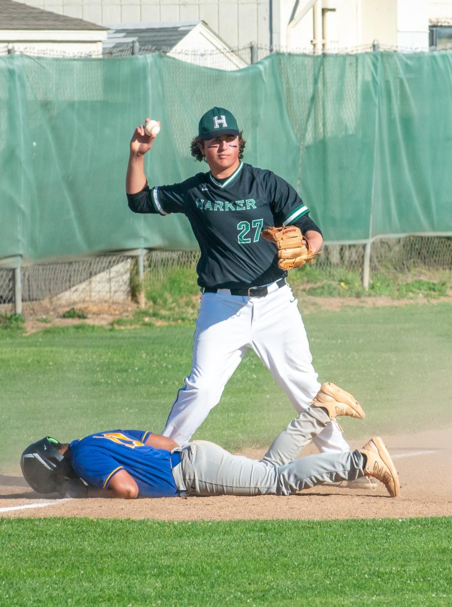 Junior Gabe Sachse prepares to throw the baseball from third base to get a Jefferson player out. The Eagles prevented all but one Grizzly from scoring a run. 