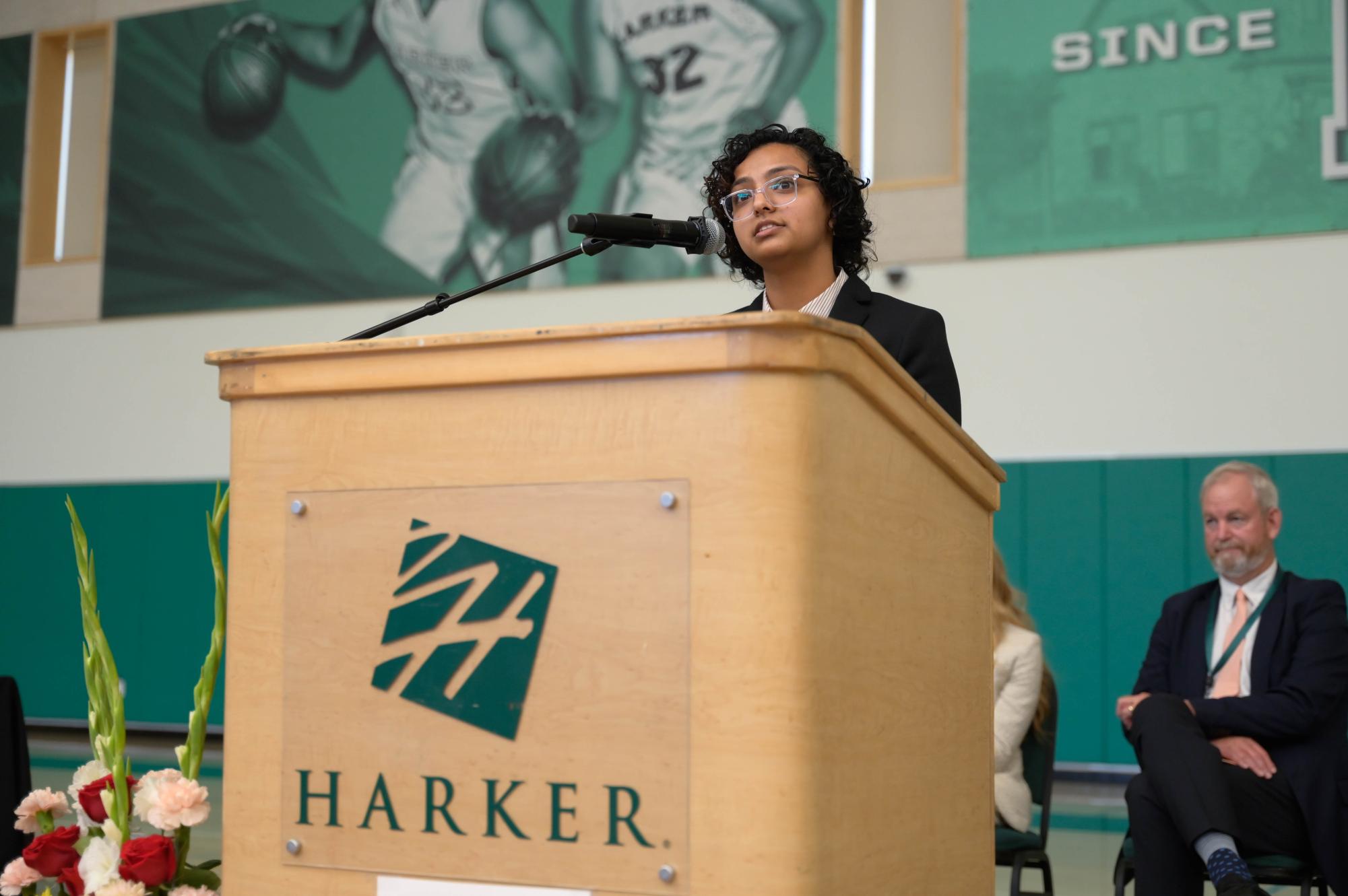 ASB President Sam Parupudi (12) welcomes attendees to a new school year. Sam welcomed each grade individually with advice and anecdotes.