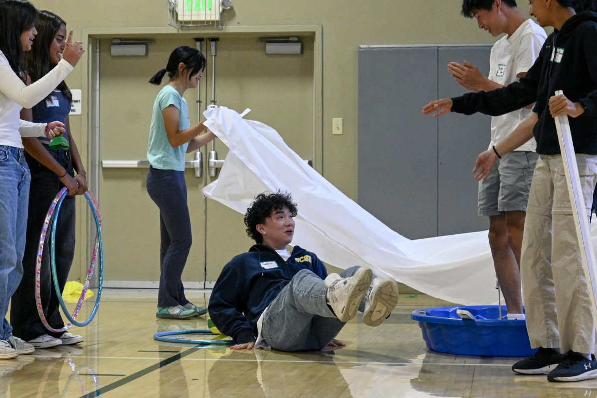 Gabe Li (12), playing Rose, reenacts the rescue scene from "Titanic" with his group. Other groups recreated movies like "Avengers" and "Harry Potter."