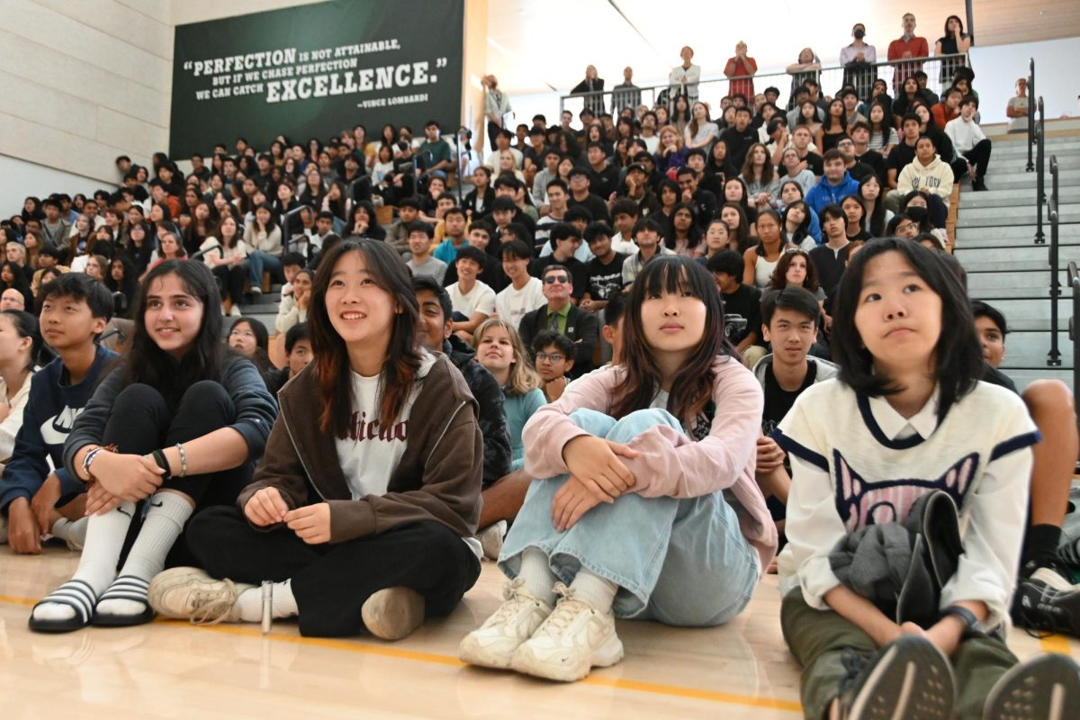 Frosh Sofe Jalil, Anya Lu, Isabella Wong and Christina Ruan watch the High School 101 video during school meeting. Student leaders from the senior, junior and sophomore classes helped create the video.