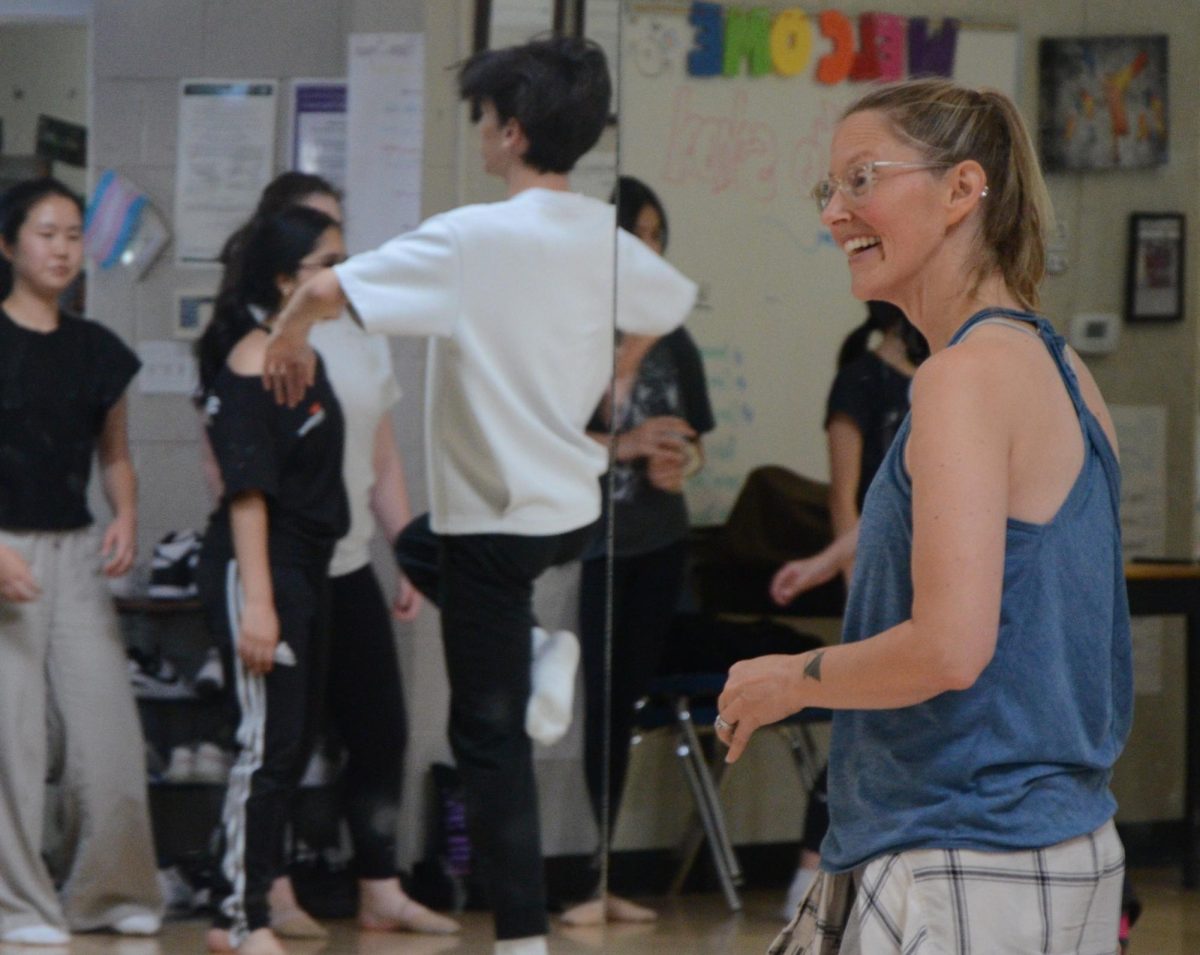 Yager smiles at a student completing the turn combination. Throughout the class she provided constructive feedback to each dancer.