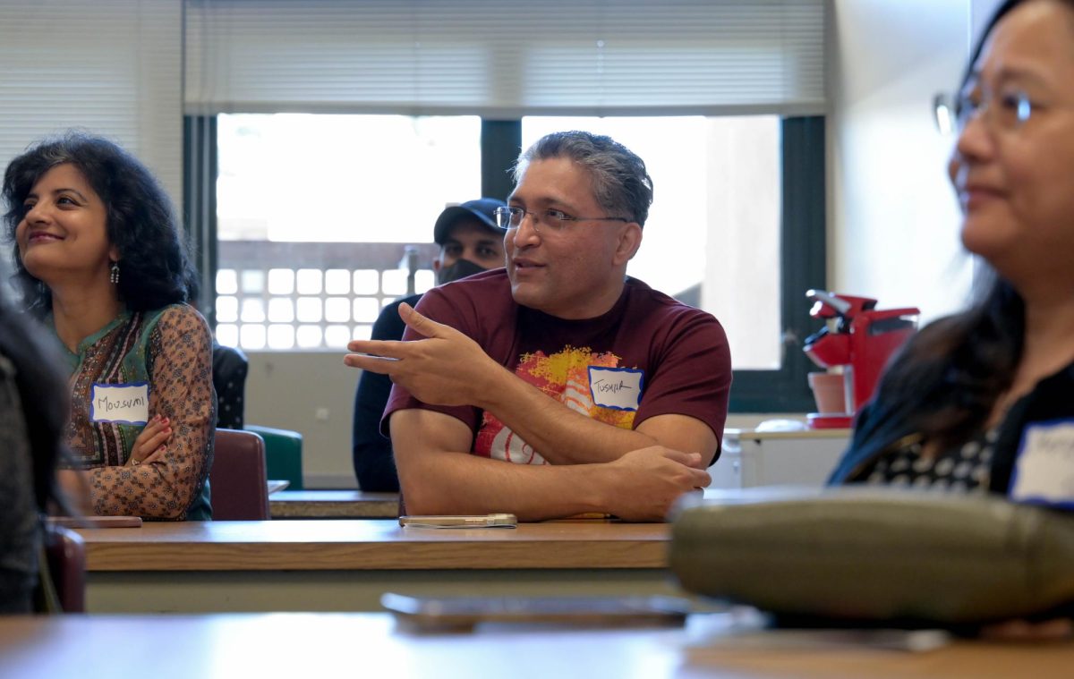 A parent answers math teacher Victor Adler's problem in Multivariable Calculus. Adler led parents through various questions students face. 