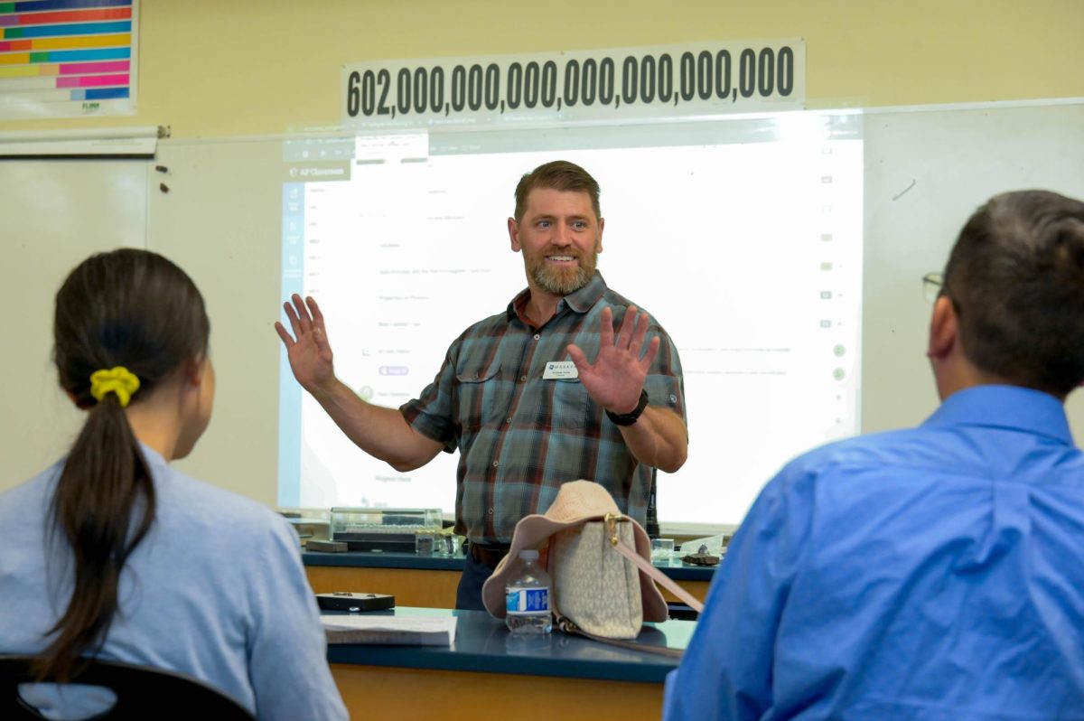 Science teacher Andrew Irvine walks parents through upcoming labs and coursework for AP Chemistry. He also announced that the class will not have a winter final. 