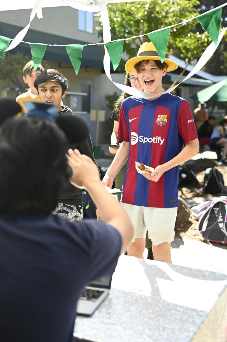 Nicolas Bastos (9) attempts to earn class points for his class by dressing up as the Yellow Hat Man from Curious George. His points were not given due to his hat being borrowed from his friend, who already received credit for the costume.