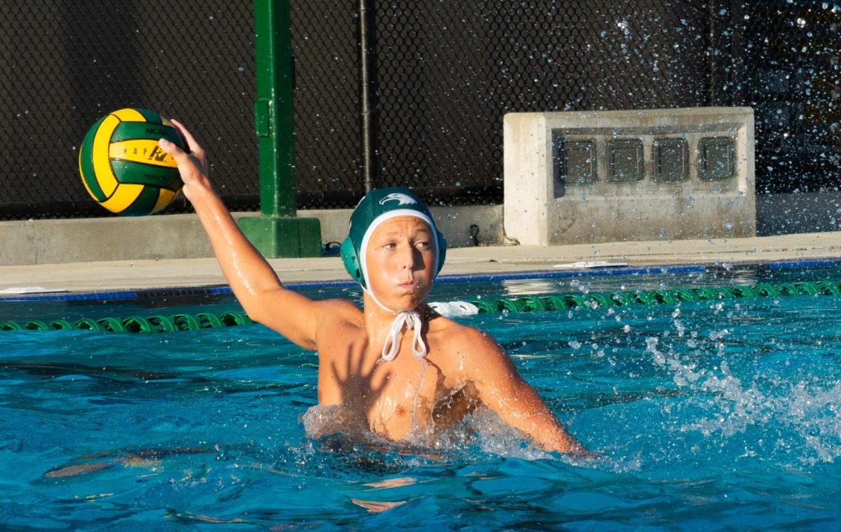 Ossi Carrico (9) looks to pass to a teammate. Ossi scored two of Harker's nine goals during the match on Tuesday.