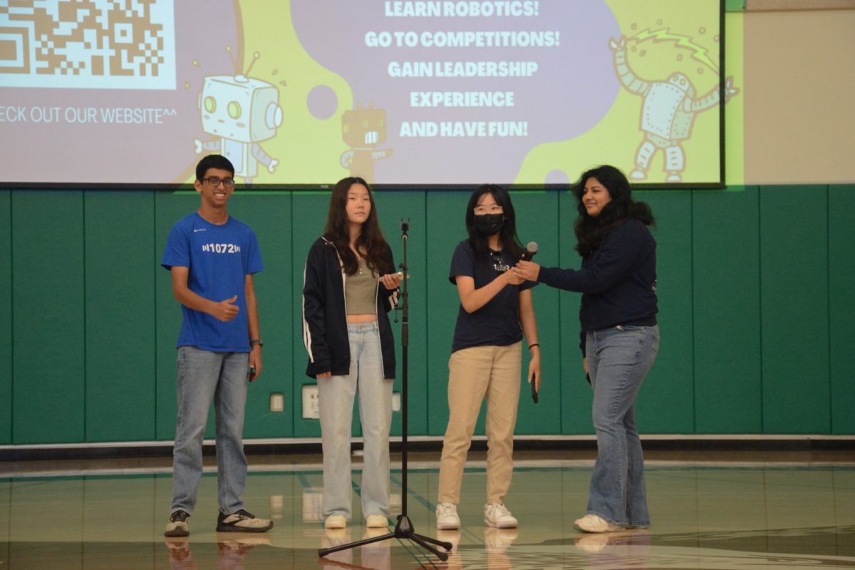 Harker Robotics members Deeya Verma (12), Tiffany Gu (12), Atharv Goel (12) and Brenna Ren (11) invited students to join Robotics and attend weekly Thursday meetings. Members can specialize in various aspects of Robotics such as programming, engineering or business.