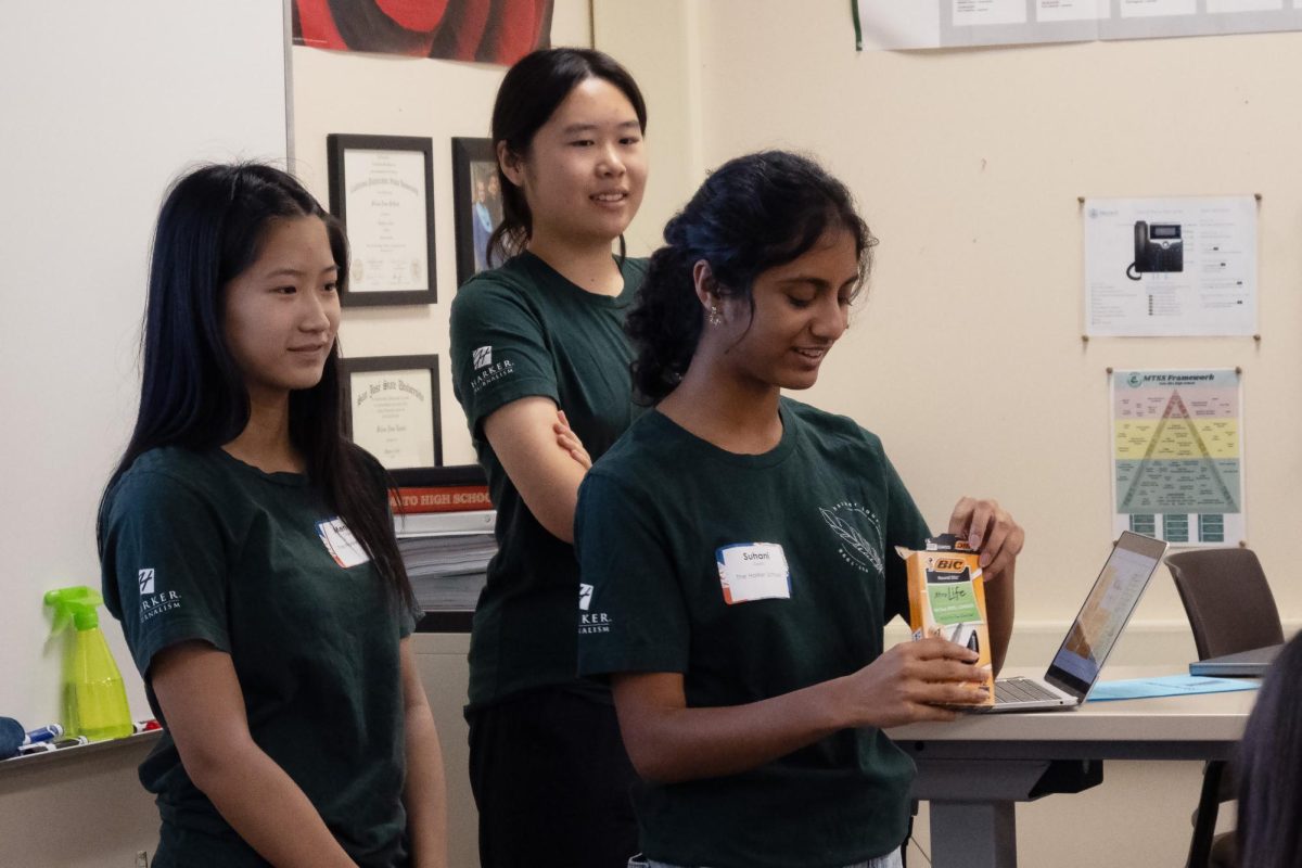 Section editors Suhani Gupta (11), Jessica Hu (11) and Mendy Mao (11) oversee the creation of shoutouts during the session. Attendees wrote messages on colorful paper that they could then address to a person of their choosing.