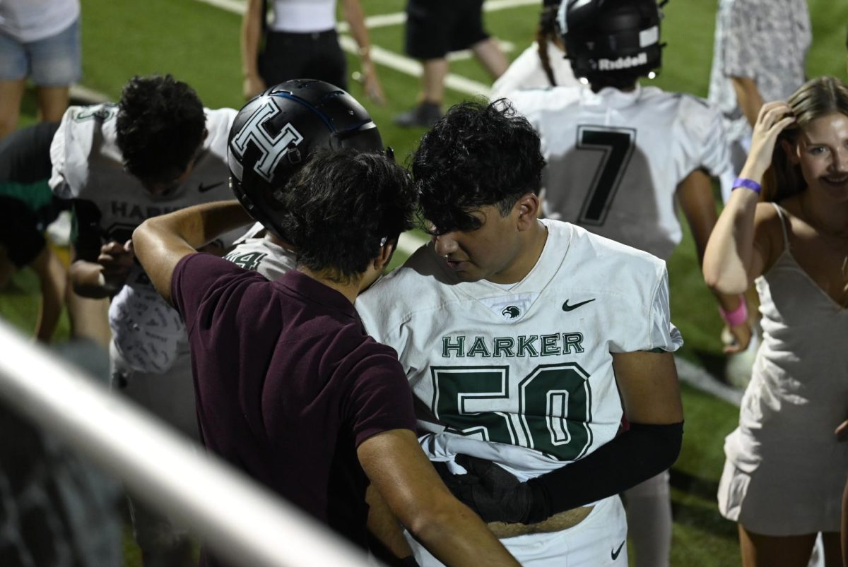 Shivraj receives a hug after winning the Homecoming game. The Eagles defeated Anzar High School 35-0. 