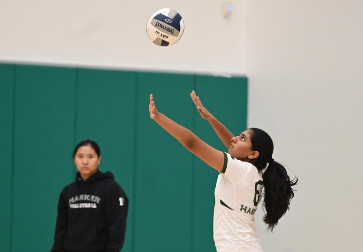 Outside hitter Divya Bhupathi (10) lines herself up for a serve. The Eagles dominated the match against Eastside College Prep, scoring a majority of their points off aces in their three set victory.