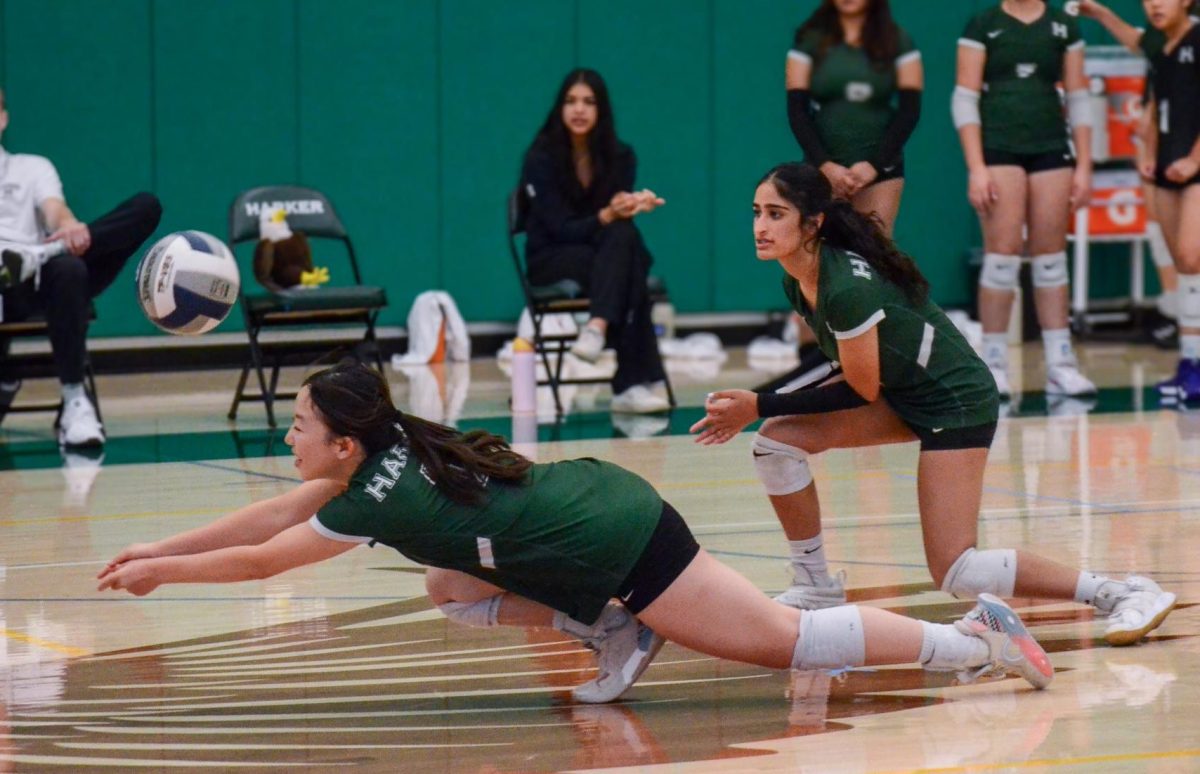 Outside Annabel Huang (10) dives to the ground to save a ball. The Eagles defeated the Knights in two sets 25-22 and 25-15.