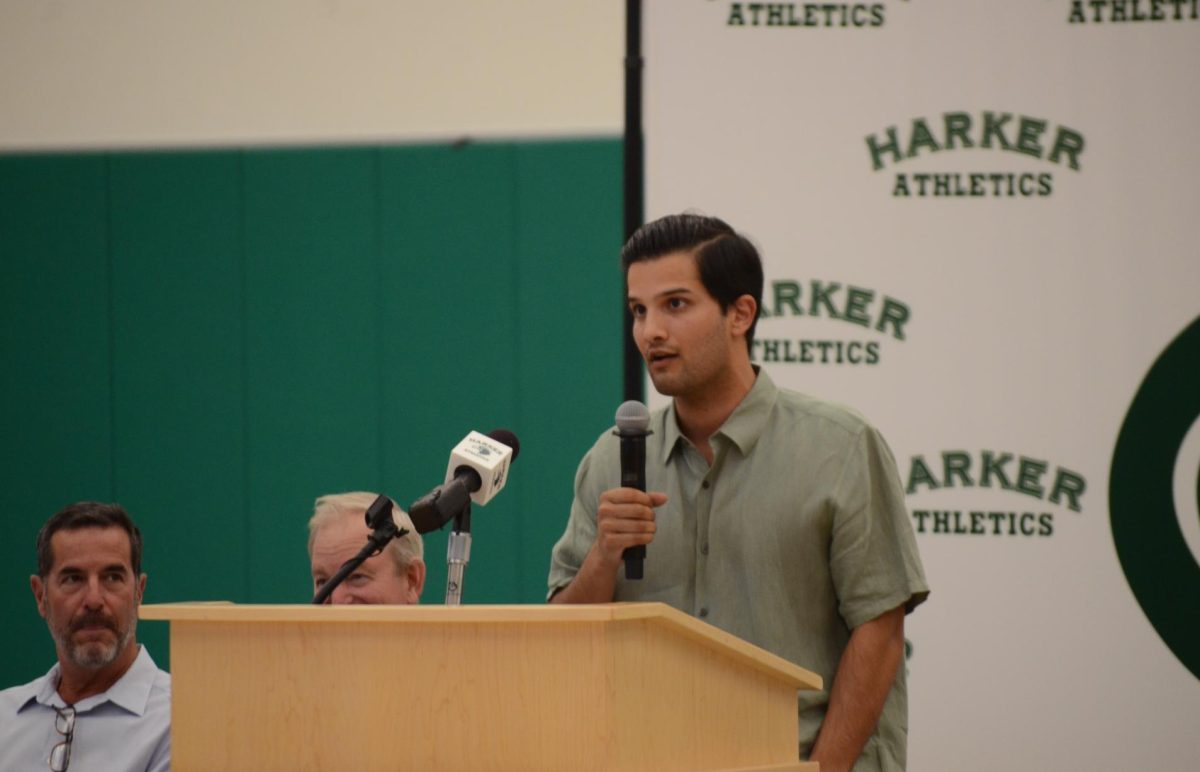 Greg Cox ('11) speaks at the podium during his Hall of Fame induction speech. Cox set records for most tackles in a game and season on the Harker varsity football team and played four years of baseball at Swarthmore College. 