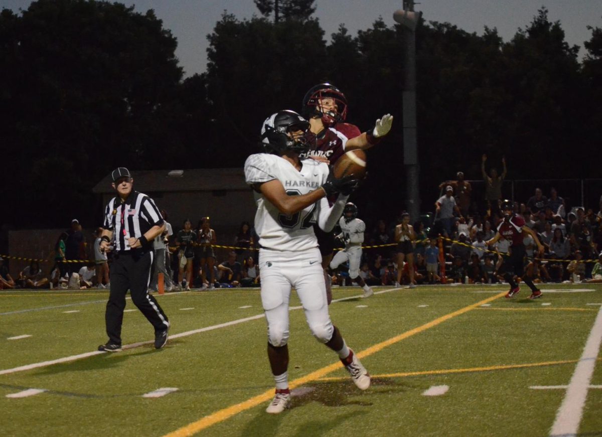 Wide receiver Arav Vuppala (10) catches the football. He continued to run 17 yards to score a touchdown, bringing the Eagles' lead to 18-0. 