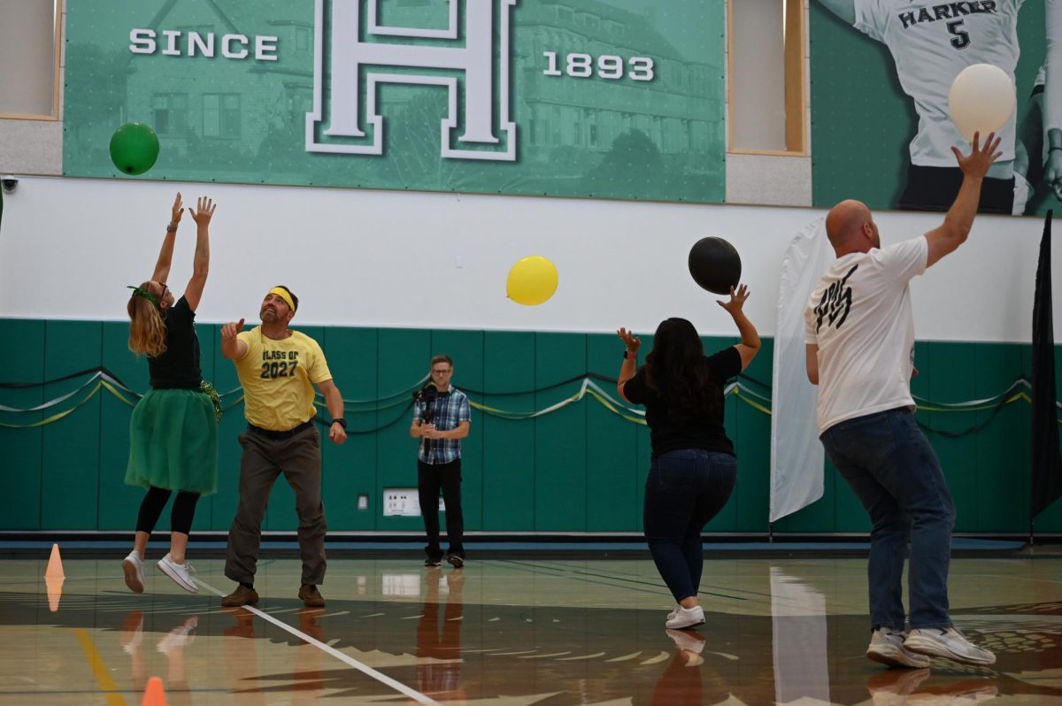 STAYIN' ALIVE: Class deans battle to be the last one standing. The final competition of Homecoming week, the game challenged them to keep their own balloons alive while popping those of the others. 