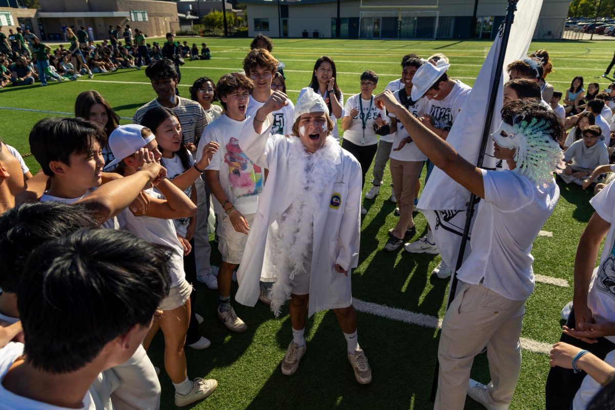 Senior Leo Sobczyn leads the Class of 2025 in a cheer before tug-of-war. The senior class beat the sophomore class and will compete against the junior class during the homecoming football game at halftime on Oct. 5.