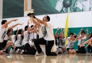 CIRCLE OF 2025: Senior Sam Parupudi hoists a stuffed animal in a "Lion King" recreation. 

For Homecoming week, each class was themed around an animation studio: Disney for the seniors, Universal Studios for the juniors, Nickelodeon for the sophmores and PBS Kids for the frosh.