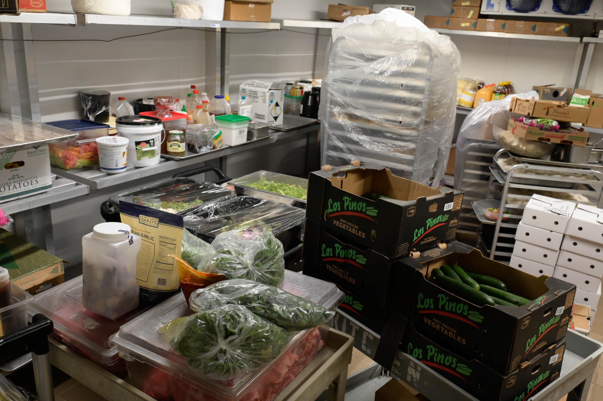 The Manzanita Hall walk-in freezer begins to fill up at 6:30 a.m. The kitchen receives shipments of produce, meats and other products every Monday. 