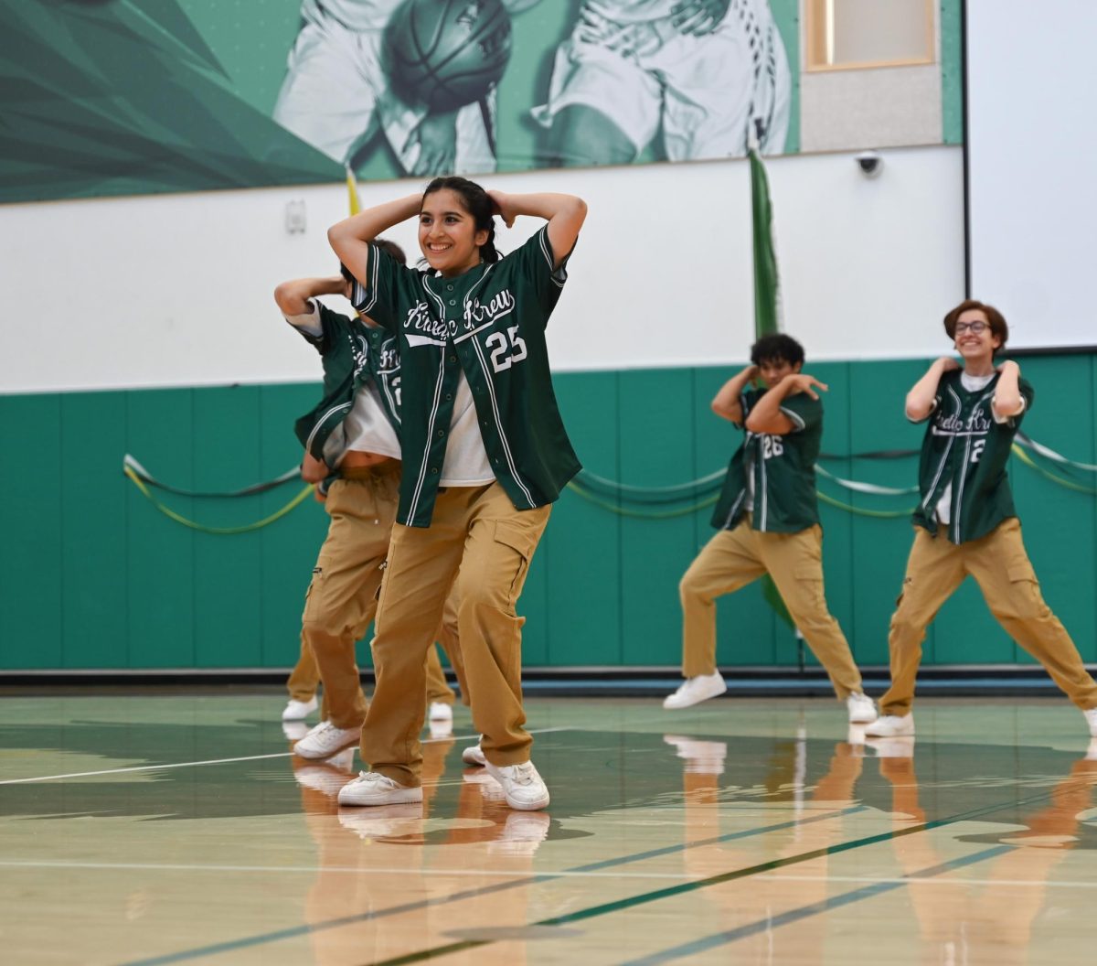 SLICK STYLE: Senior Kinetic Krew (KK) dancer Tiana Salvi opens the rally. Performances from KK, the cheerleading team and Pep Band complemented the grade-based games and dances.