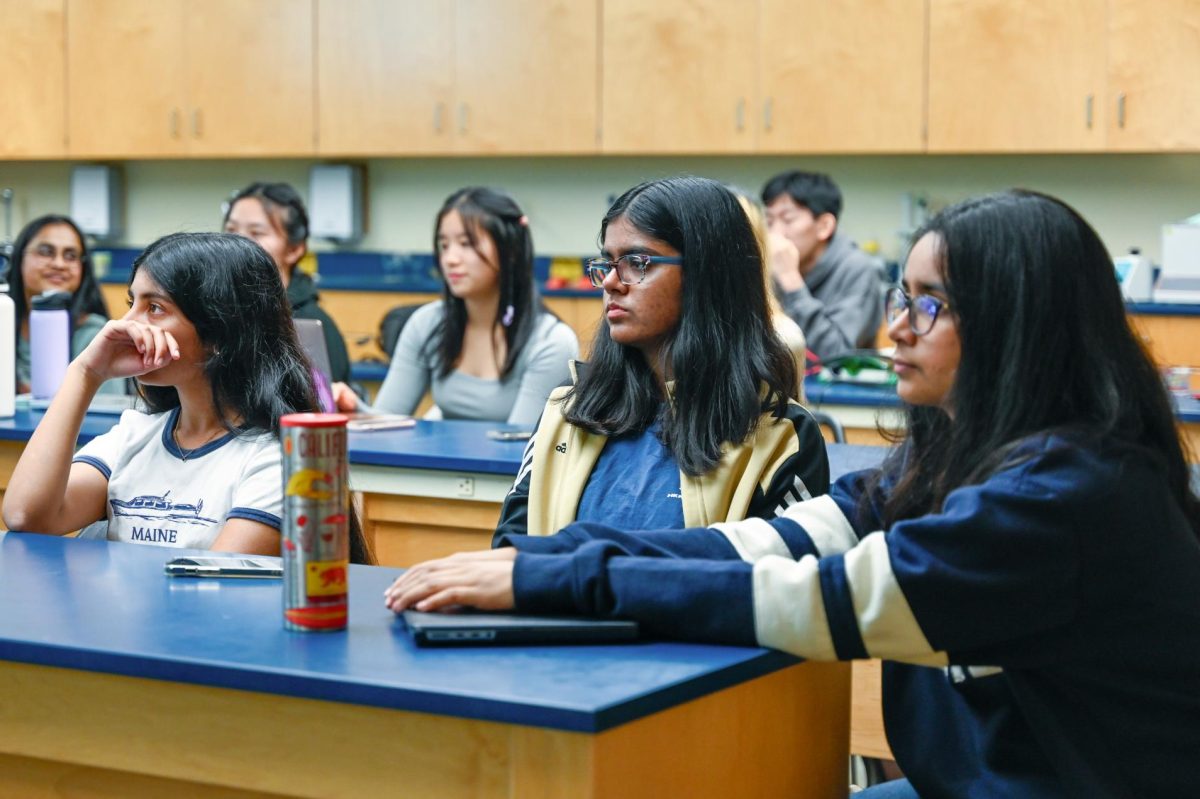 Sophomore Chetana Pramanik and frosh Dyuthi Vallamsetty learn about the different competitive events at HOSA conferences. Categories include Health Informatics and Medical Law and Ethics.