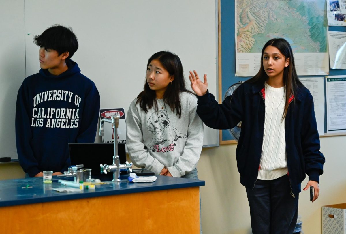 Vice President of Conference Affairs Angelina Antony (11) speaks about her experience participating in the Biomedical Laboratory Science competition. Officers introduced members to the organization's mission and conference events.