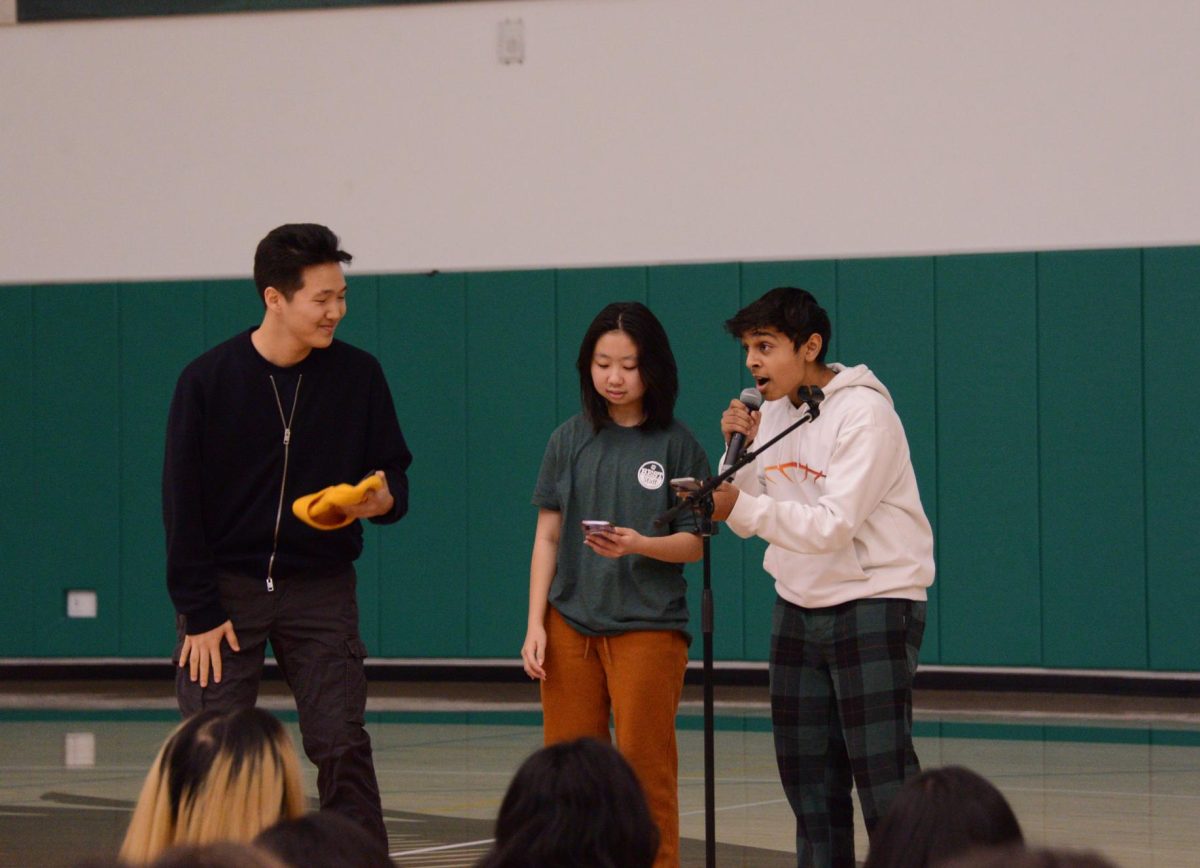 ASB Outreach Committee member Avi Gupta (9) speaks about the sock drive. He thanked the community for donating donating over 2,000 pairs of socks, with the class of 2027 donating 1,369 pairs.