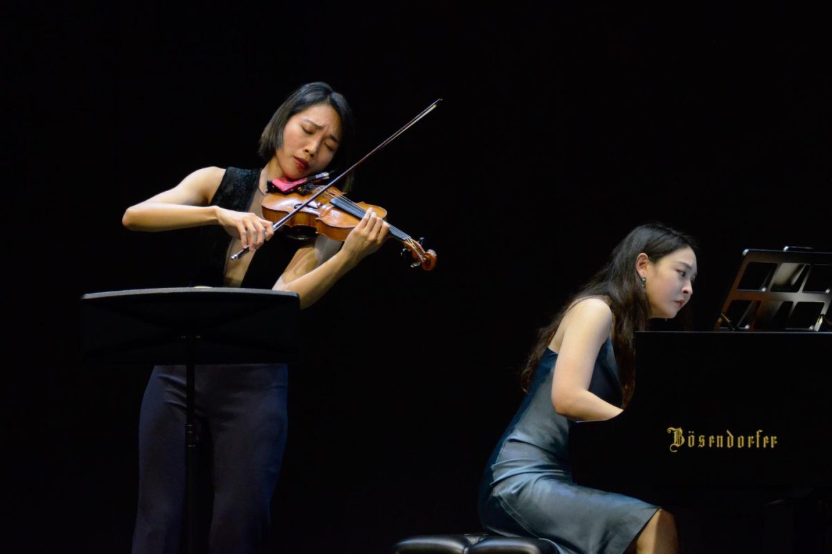 Violinist Nancy Zhou and pianist Serena Wang play a duet on their respective instruments. “Nancy tells a story on the violin like no one else, and Serena is just brilliant,” their manager Earl Blackburn said.