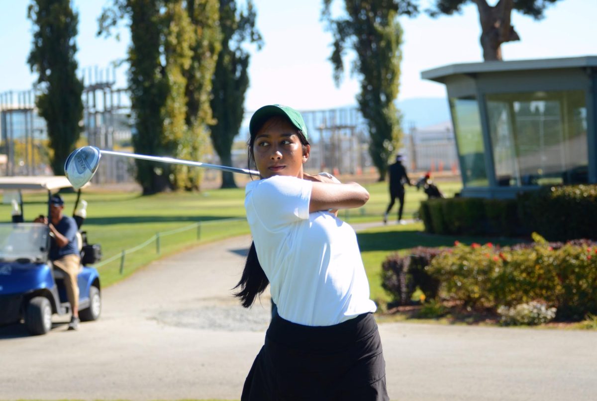 Varsity girls golf player Anika Pallapothu tees off on the first hole at Moffett Field Golf Course. The team placed fifth at the NorCal Regional Championship, with an overall record of 16-0.