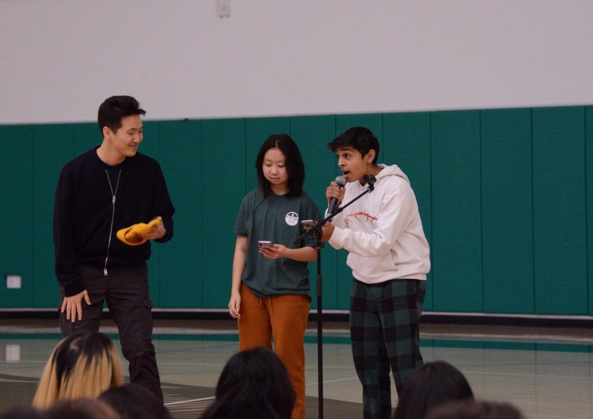 ASB Outreach Committee member Avi Gupta (9) speaks about the sock drive. He thanked the community for donating donating over 2,000 pairs of socks, with the class of 2027 donating 1,369 pairs.