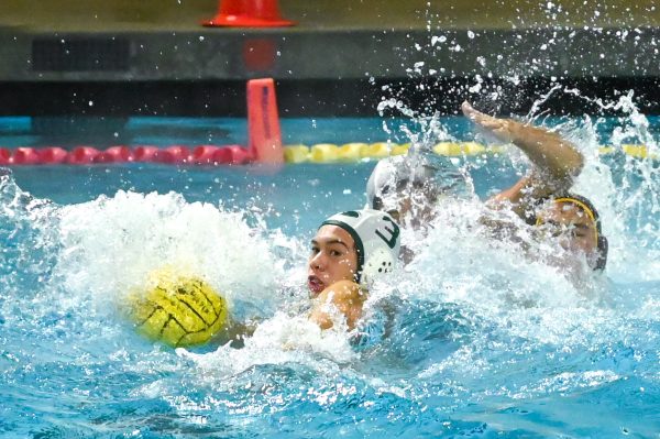 Driver Oskar Baumgarte (12) fights to maintain possession of the ball during the Open Division CCS semifinal match against Saint Francis. “We knew it would be a hard game from the start, but overall, as a team, we were just happy to be playing," Oskar said.