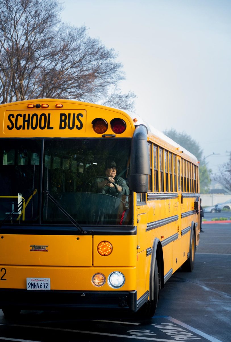 Bus driver Shellie Maclachlan pulls into the front loading zone at Harker's Union campus. The buses arrived in two waves at around 7:30 a.m. and 7:55 a.m.