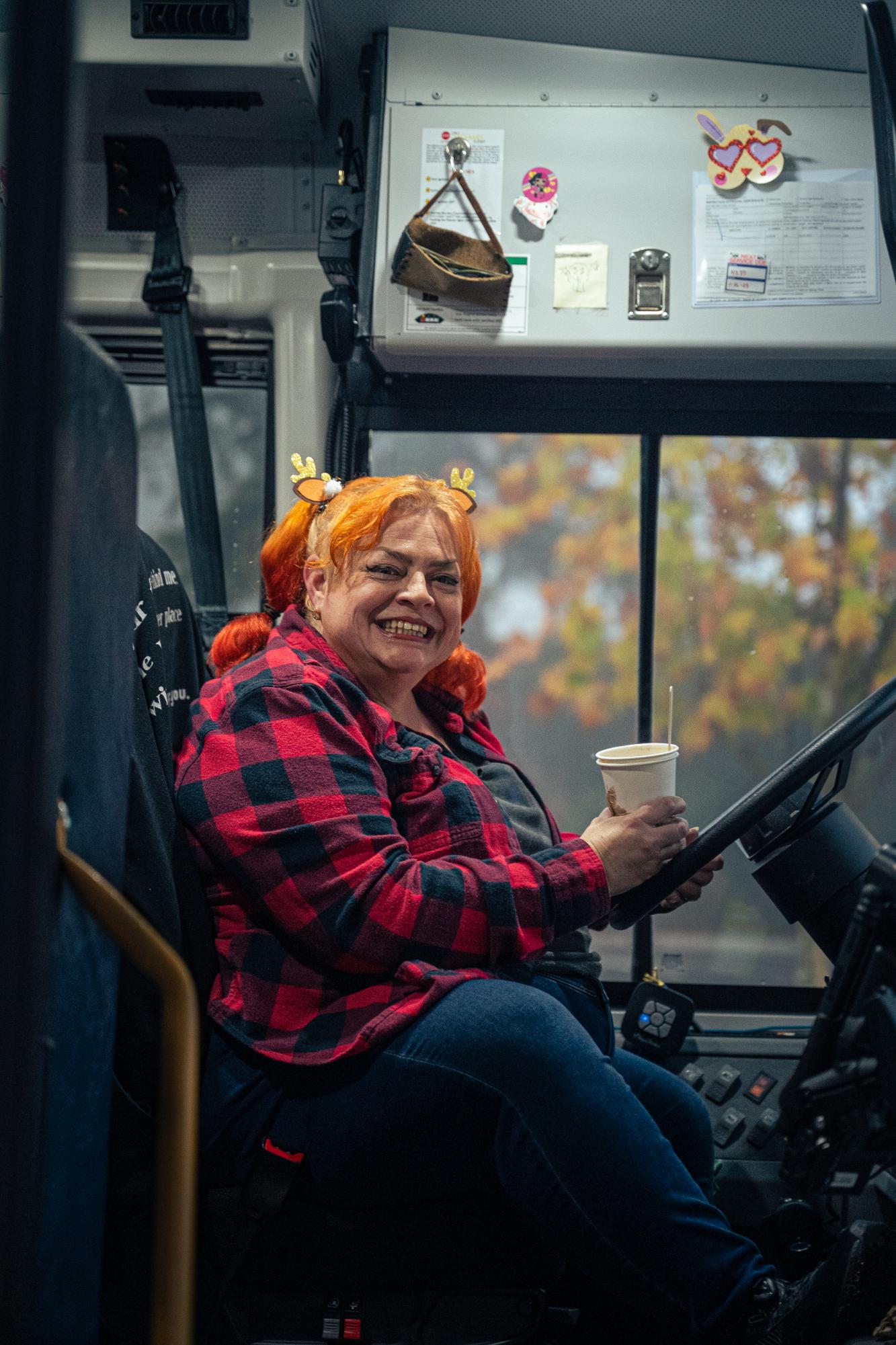 Figone holds a cup of oatmeal and smiles. "Every morning, that's all I have time for," she said, digging in with a wooden spoon.